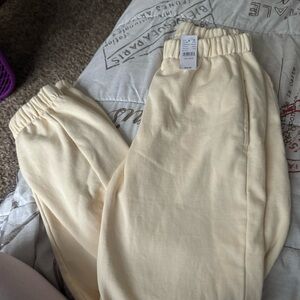 Nwt brandy melville yellow cream sweatpants